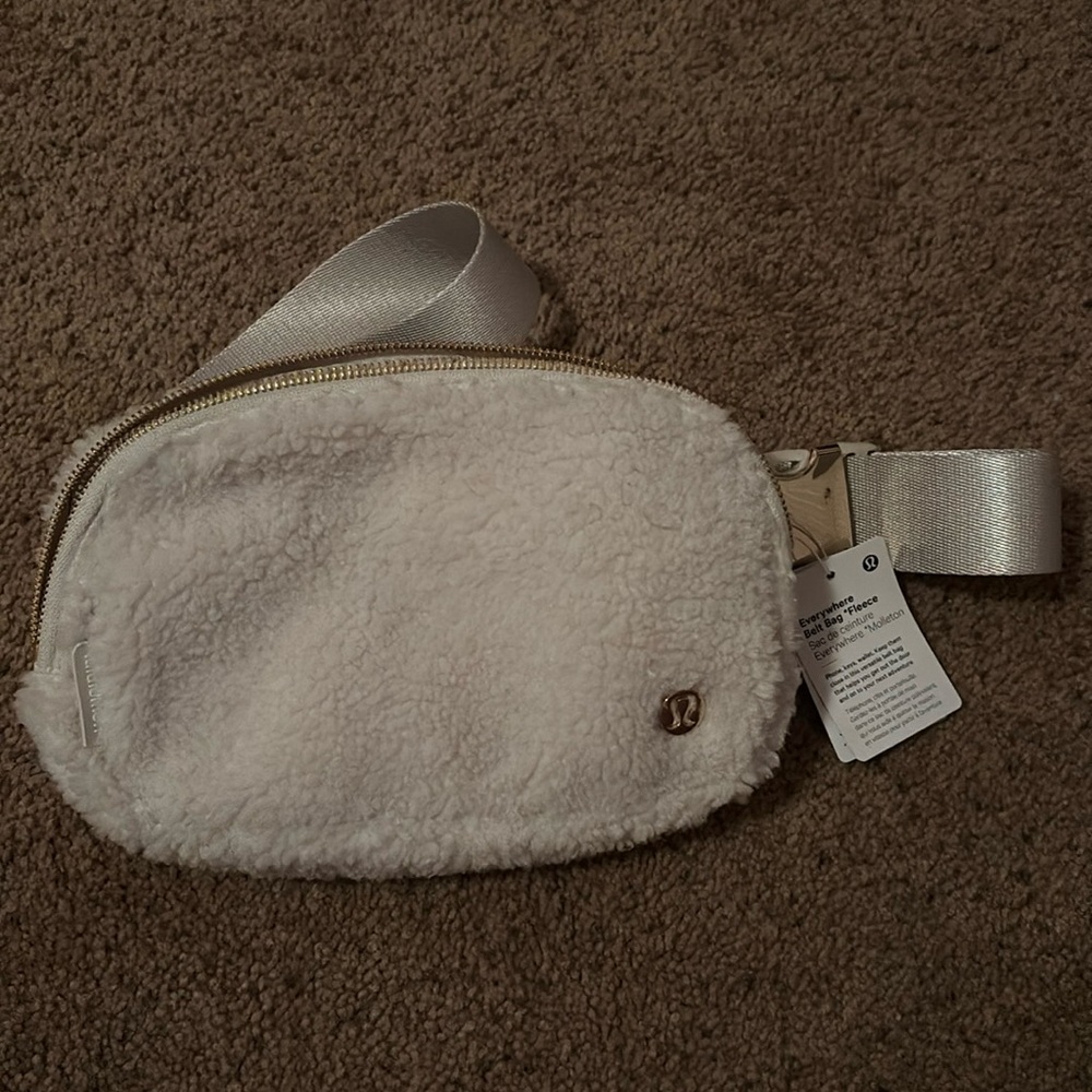 lululemon everywhere fleece/sherpa belt bag in white and gold